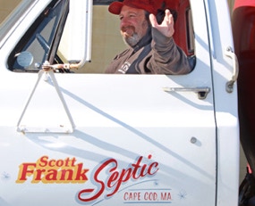 Scott Frank Septic truck with Scott Frank waving to you